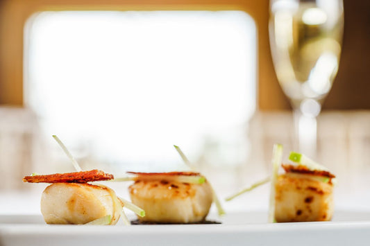 Gourmet seared scallops elegantly plated
